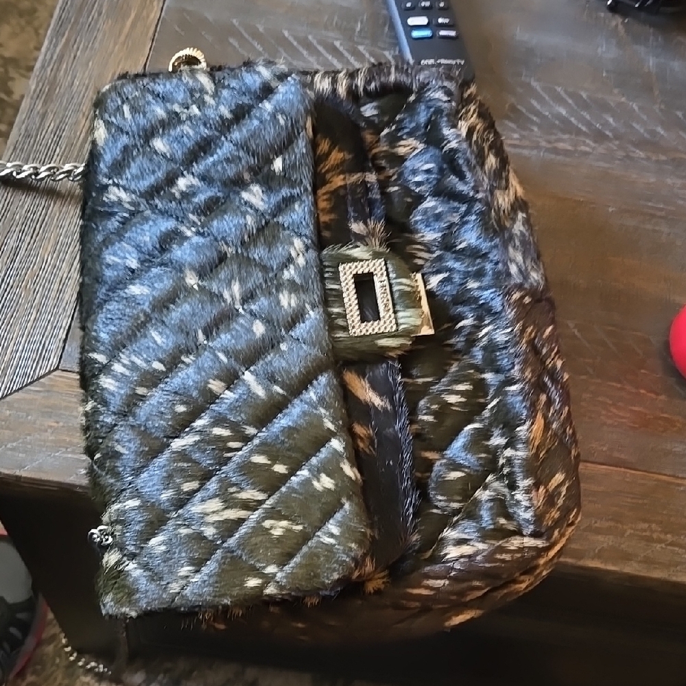 CHANEL Black and Brown Quilted Crossbody Bag with Gold Clasp
